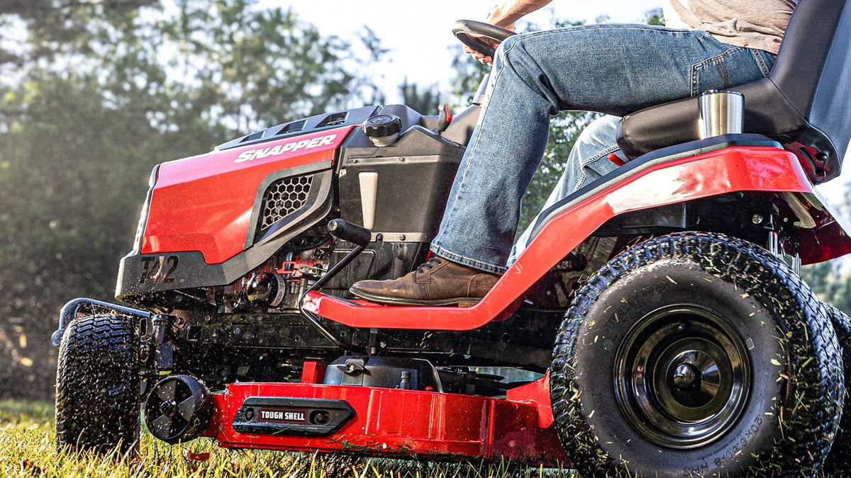 Snapper T42 42-inch fabricated deck riding lawn tractor on a residential lawn